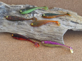 Softbaits on driftwood